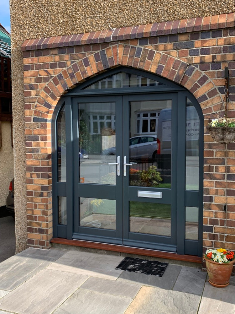 Bespoke exterior timber double glazed  French Doors with arched frame.