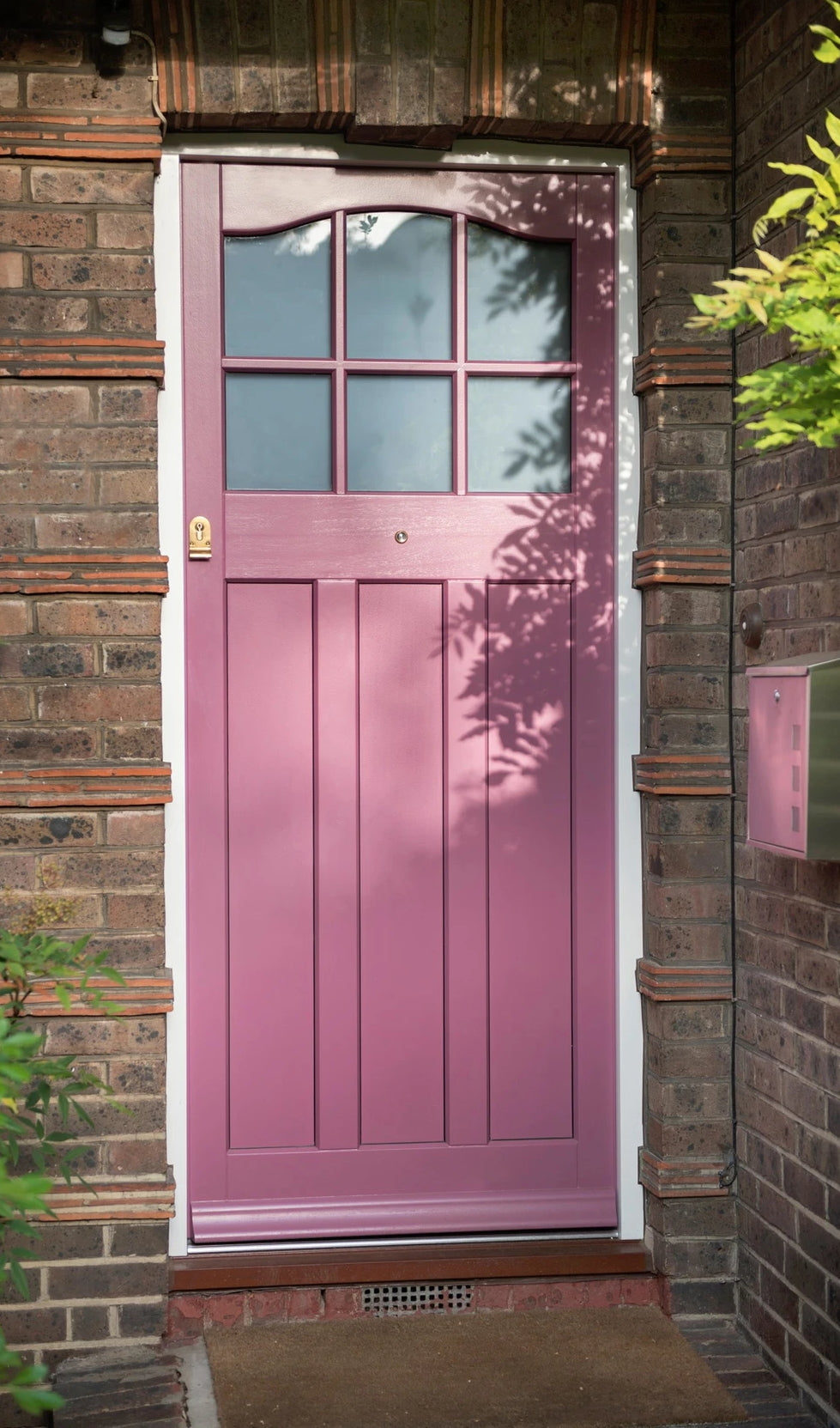 Bespoke External hardwood door with frosted glass.